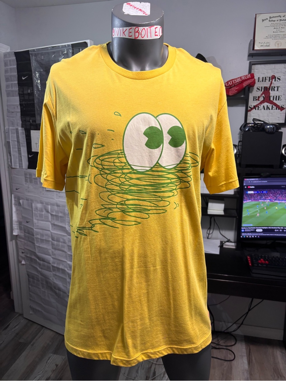 Nike Yellow Short Sleeve Tee with Green Eye Graphic